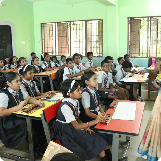 Nallamani classroom filled with students learning with abacus tools